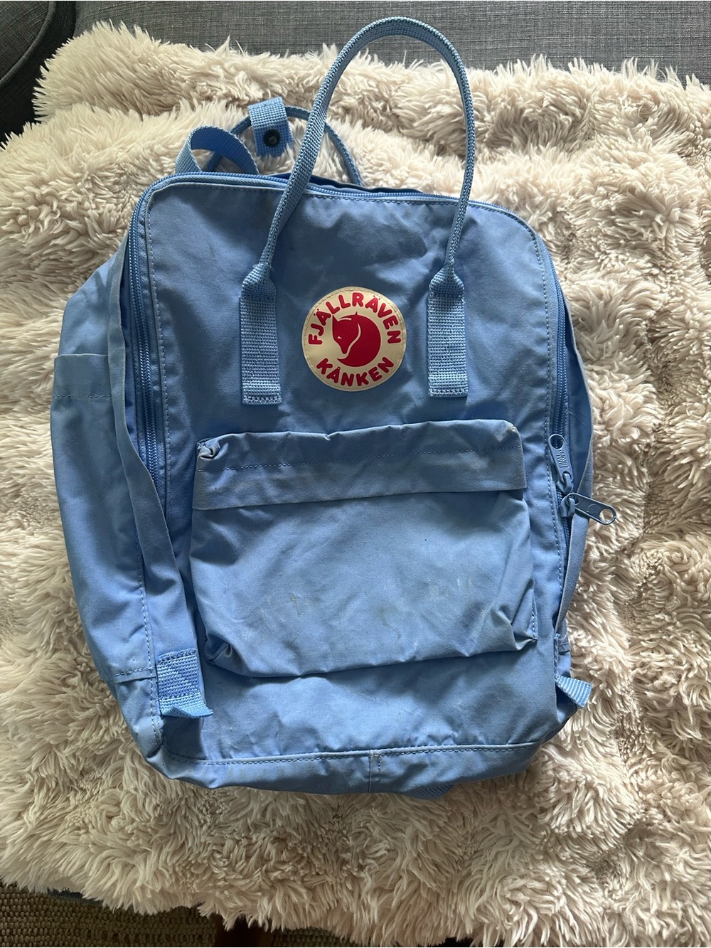 Fjallraven Kanken Backpack in Light Blue with Red Logo